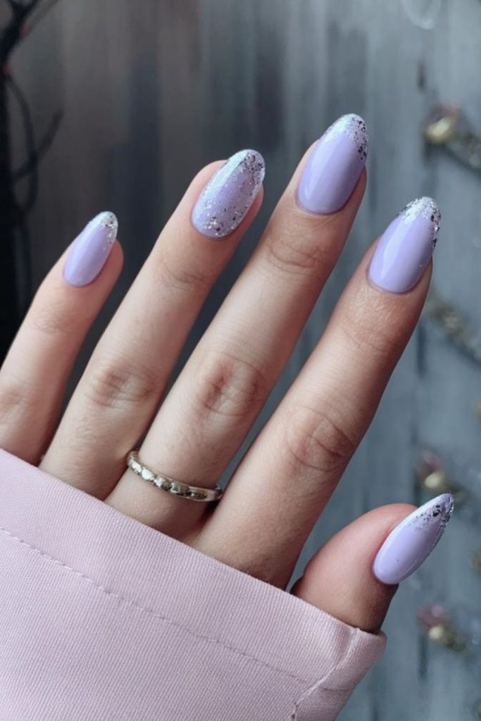 Lavender nails with scattered micro-sparkles