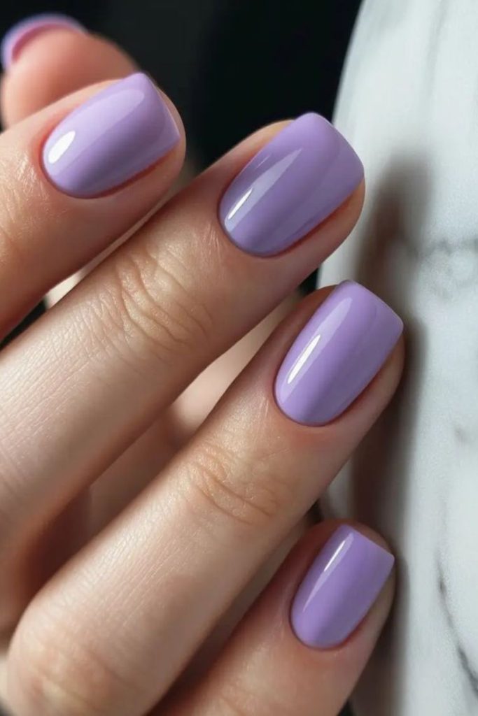 Soft lilac pastel shiny nails