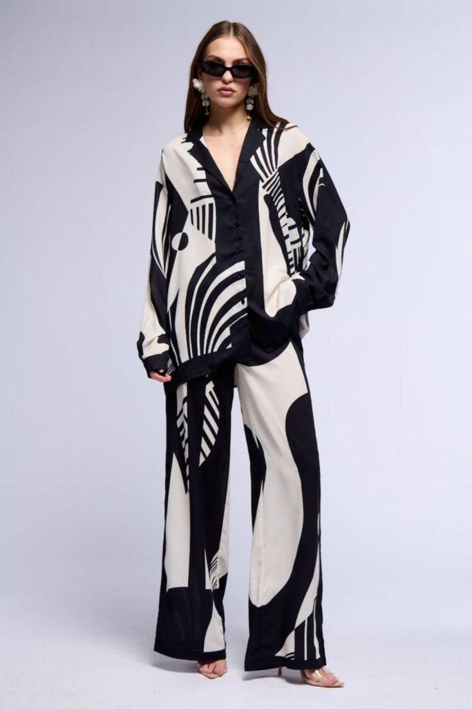 Lunar patterned oversized shirt black trousers