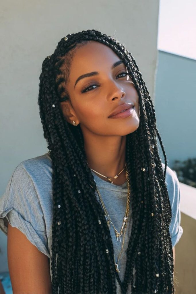 Black braids with dangling silver charms