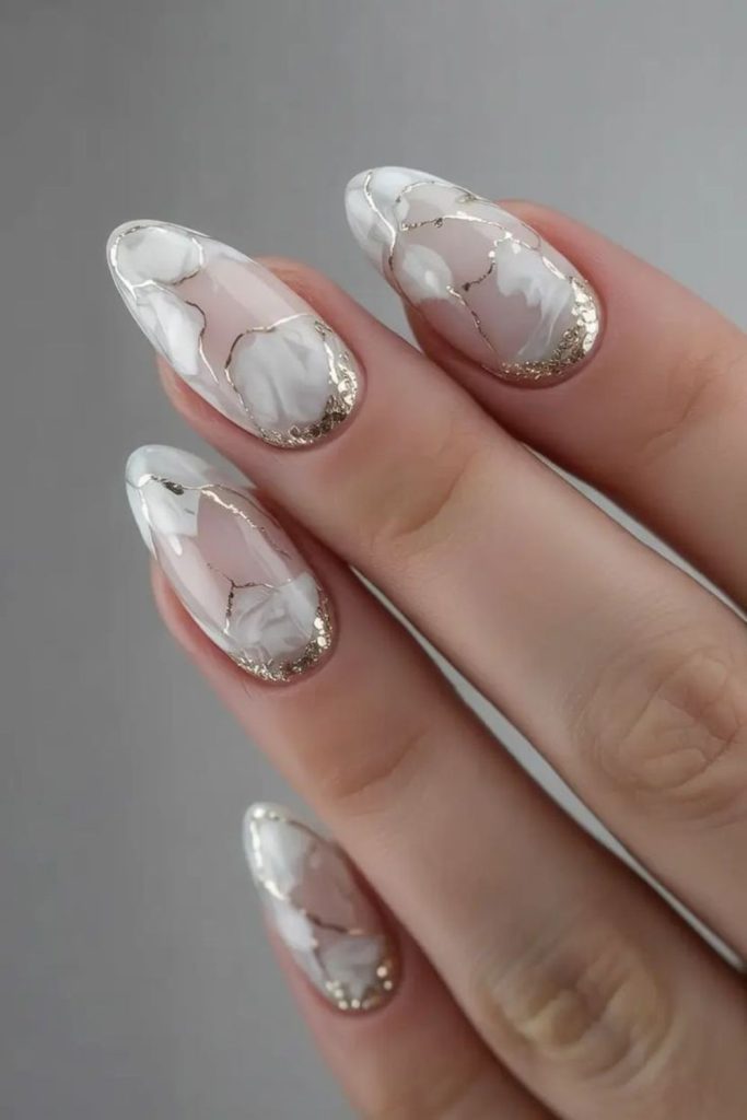 Ivory grey nails with gold veins