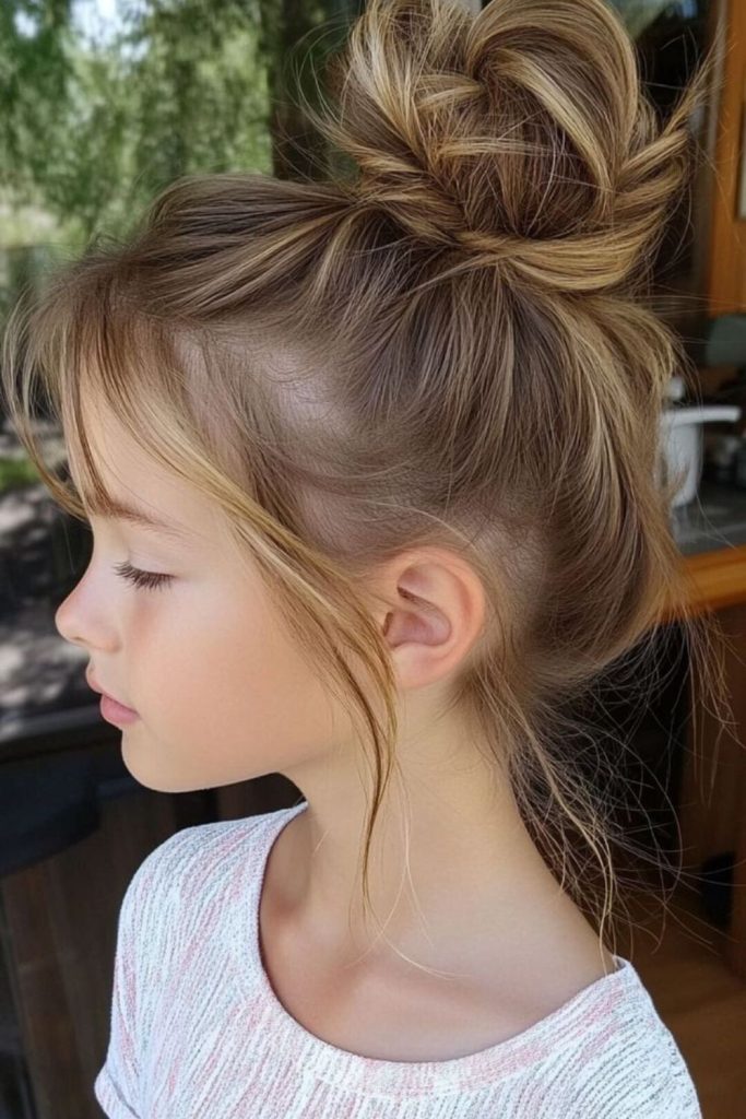 Twisted bangs framing youthful, playful face