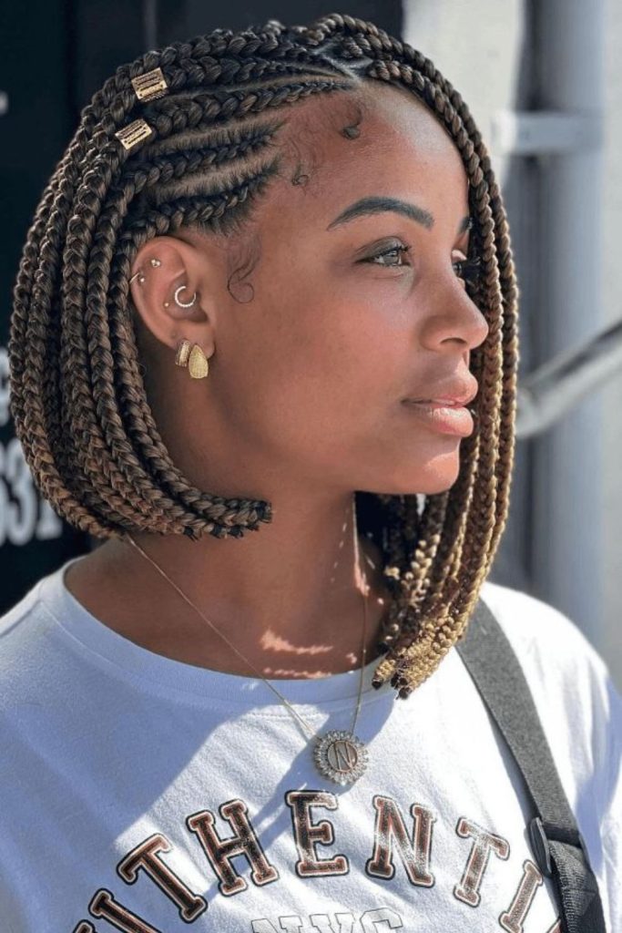 Green-threaded braids with subtle gold accents