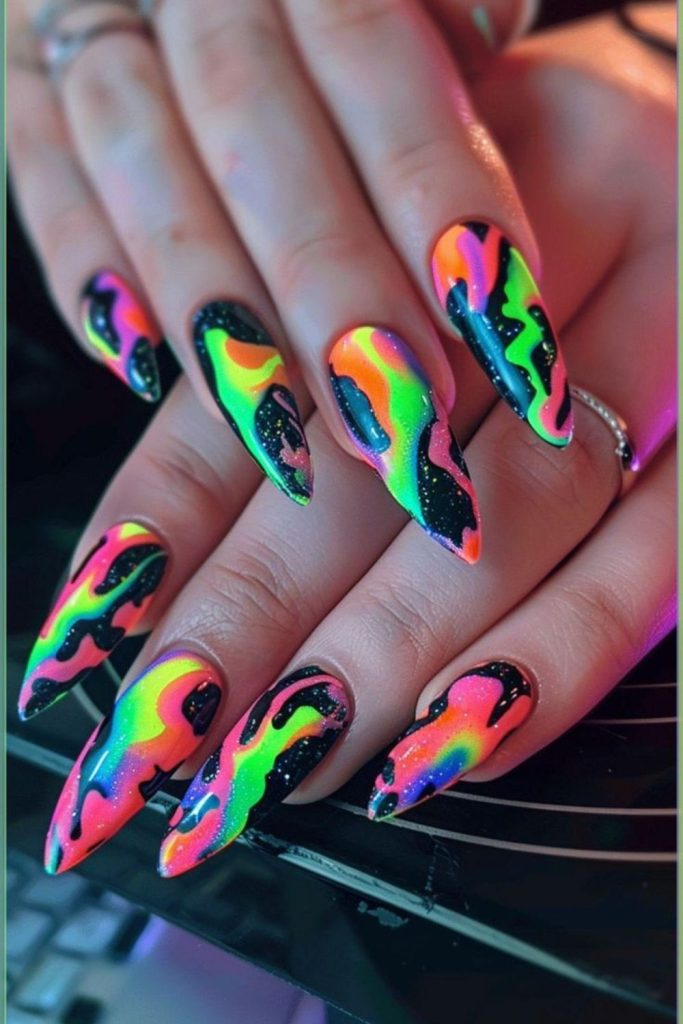 Jagged neon nails with chaotic energy.