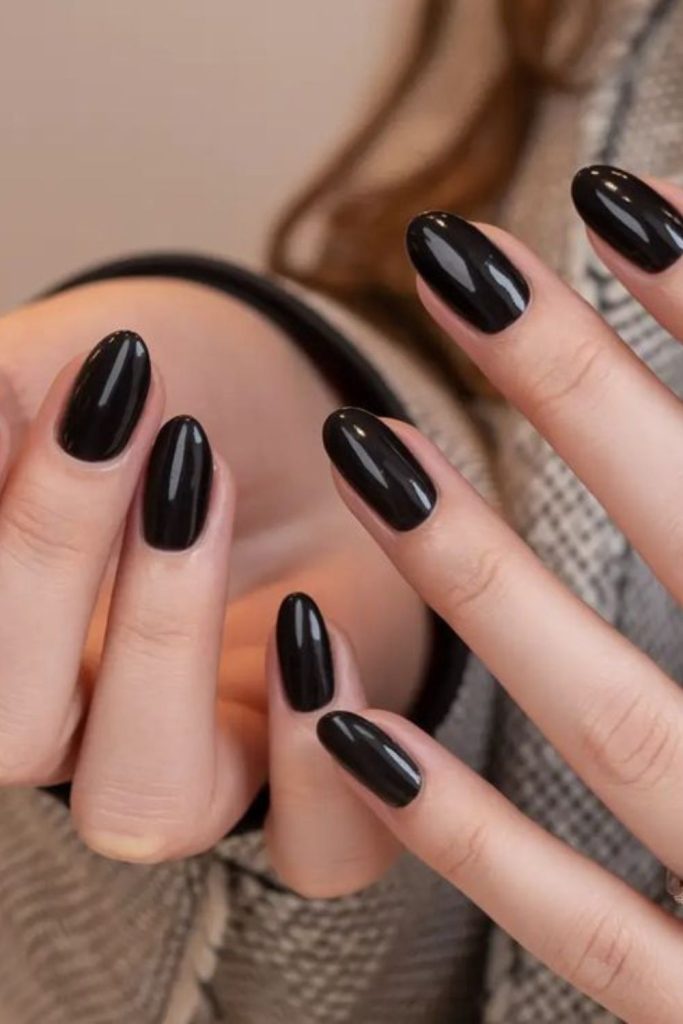 Black nails, shadowy mysterious style.