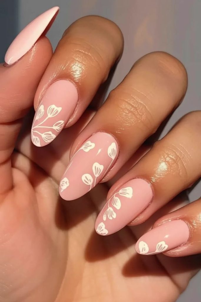 Peach floral spring nail look.