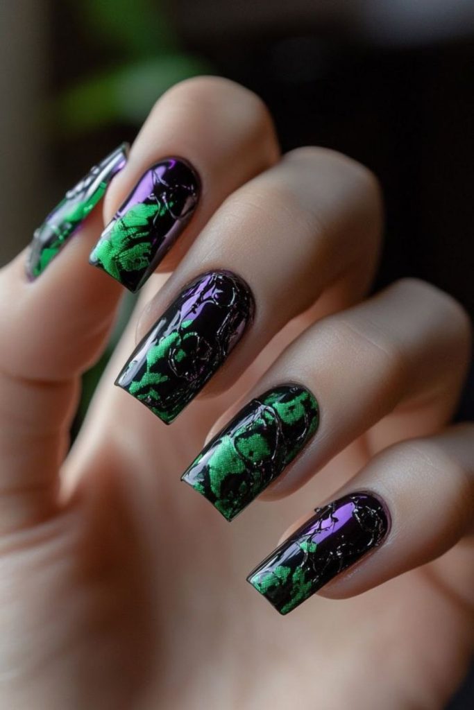 Plum nails with tiny green accents