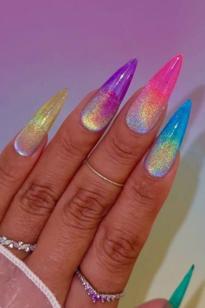 Holographic rainbow nails with fragmented shine.