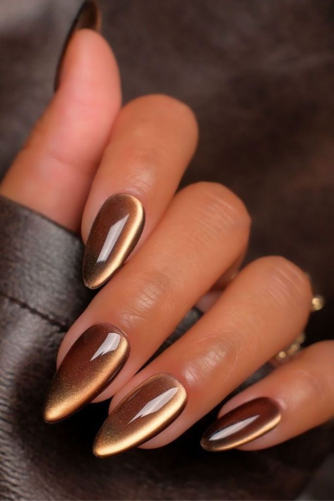 Mocha nails with gold fleck tips