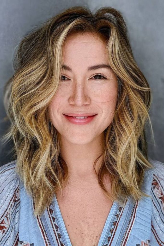 Layered midi shag with lifted crown.