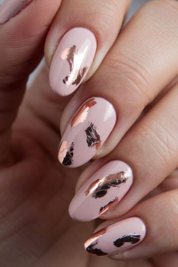 Blush pink nails with metallic rose