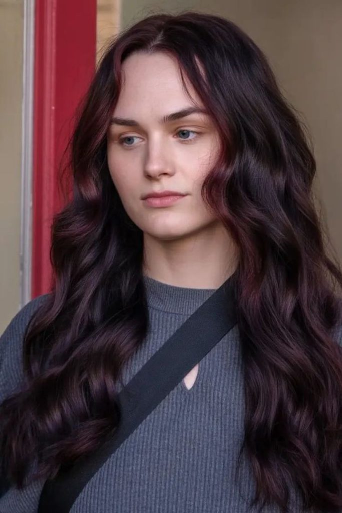 Long rosewood layered flowing hairstyle