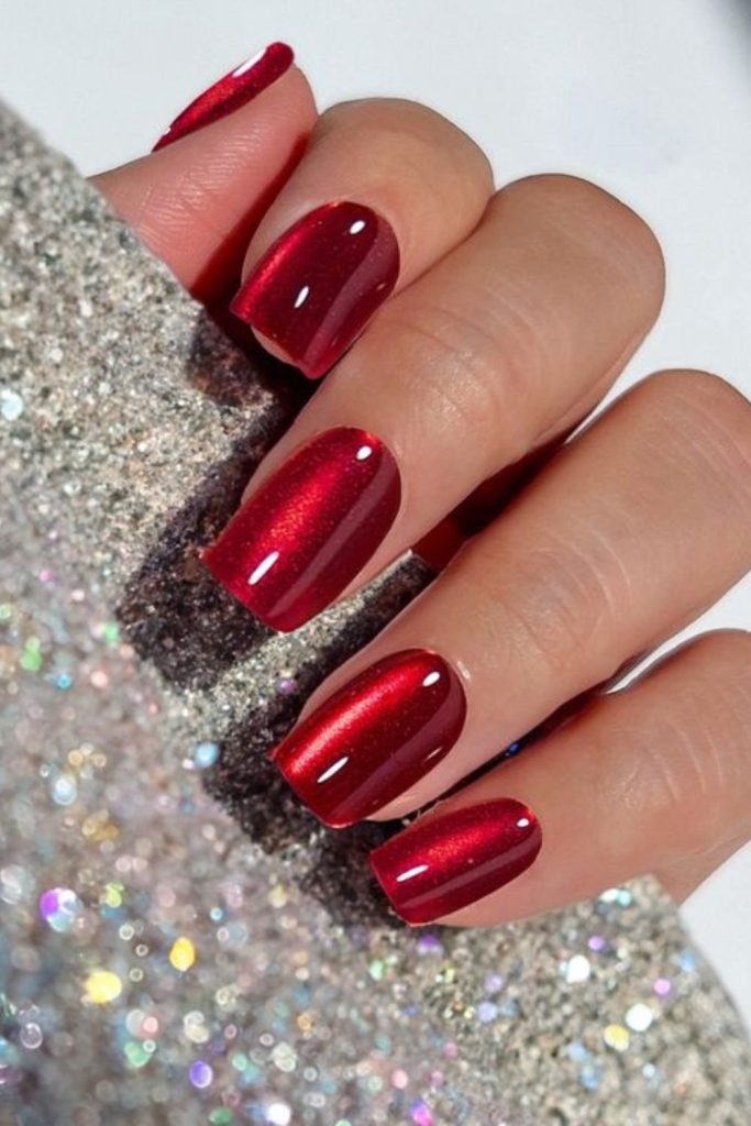 Ruby nails, fiery glowing shimmer.