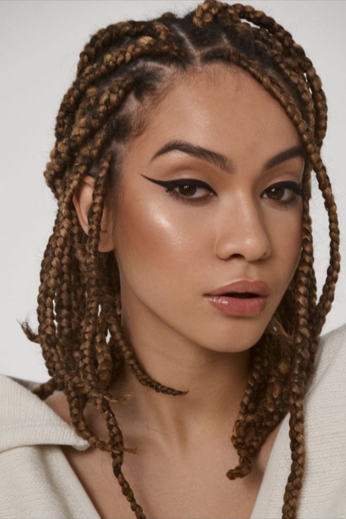 Short wavy braids with scattered beads