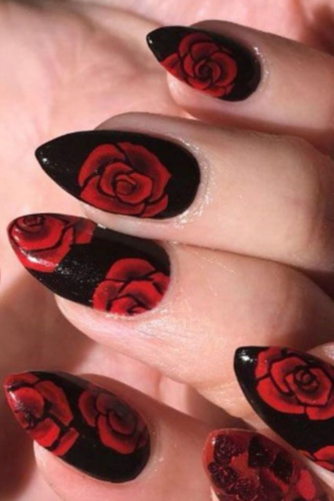 Black nails with jagged red petals