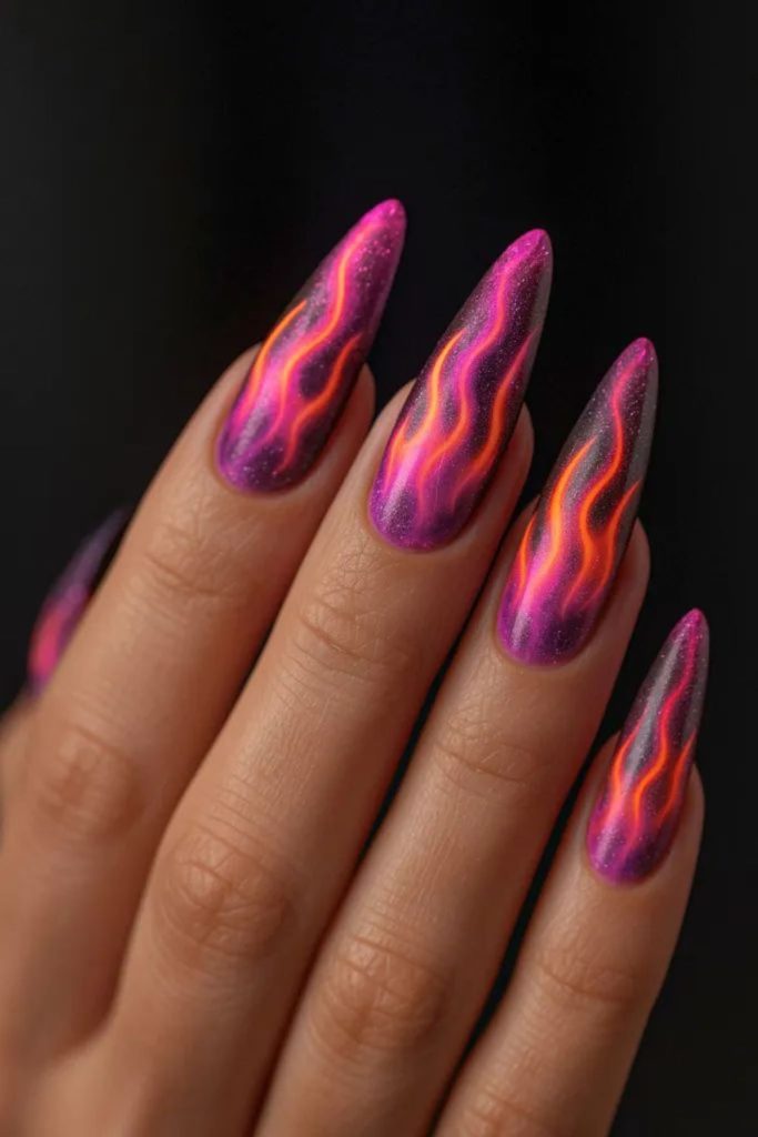 Purple nails with red flame motifs