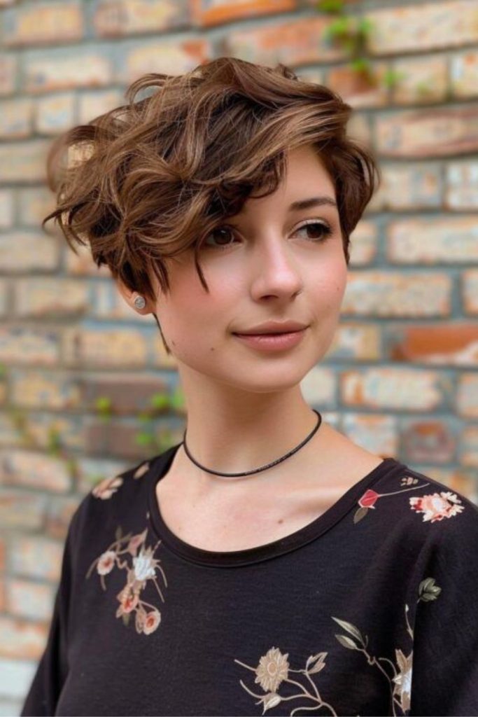 Flicked bangs on short layered pixie