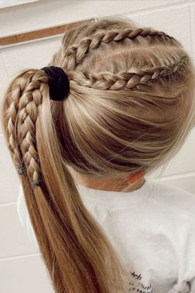 Sleek side-swept ponytail with sparkle