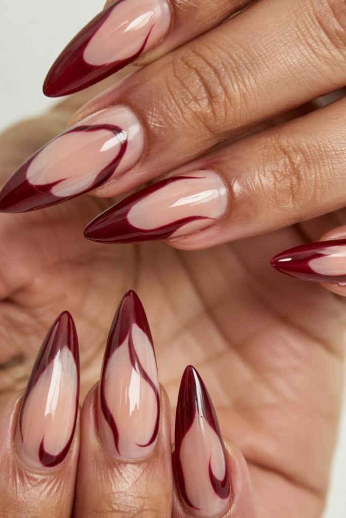 Nude ochre nails with maroon stripes