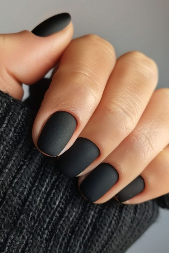 Matte black mysterious minimalist nails