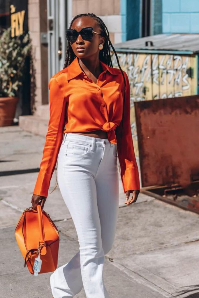 Tangerine blouse white fitted pants