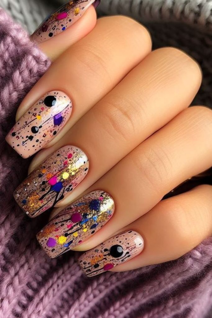 Random colorful abstract splotches on nails
