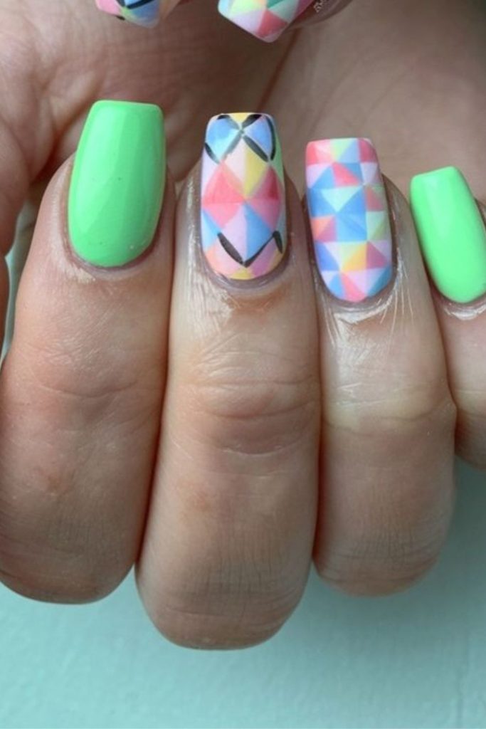 Small triangles scattered over muted nails