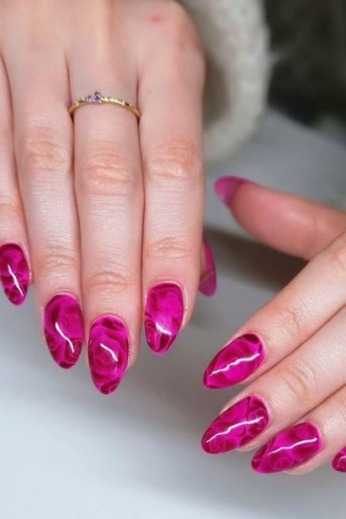 Berry pink nails with textured streaks