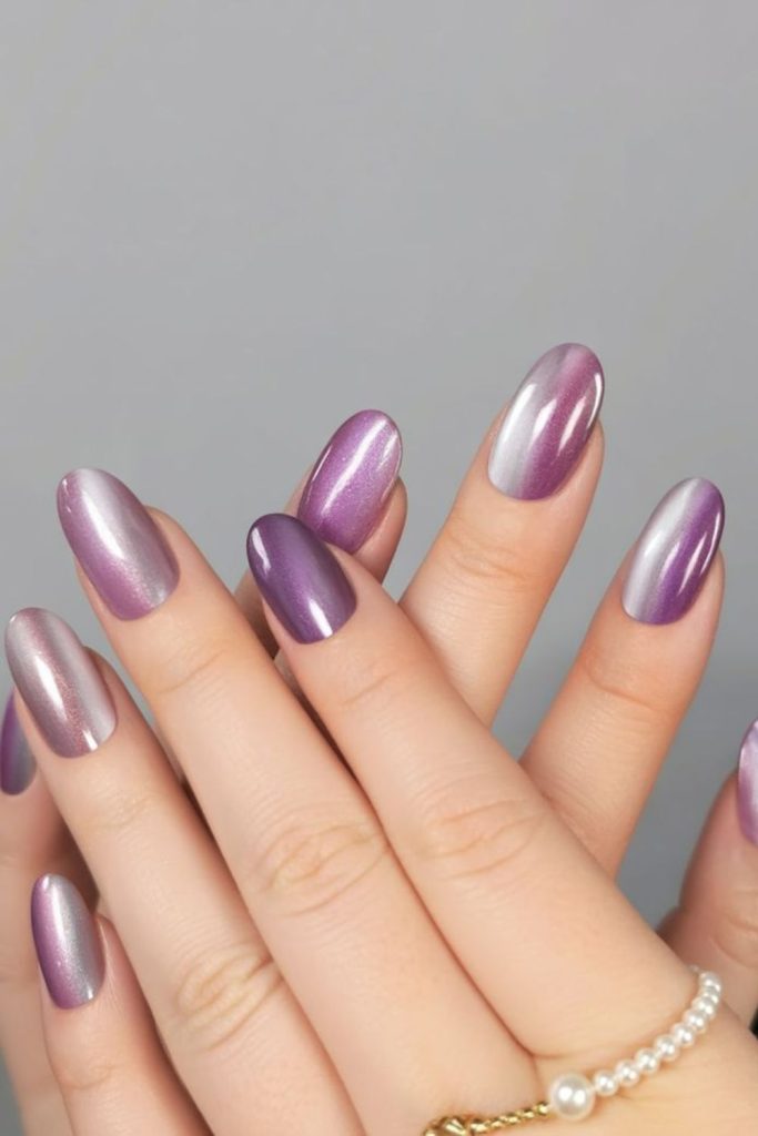 Soft lilac nails with subtle sparkle.