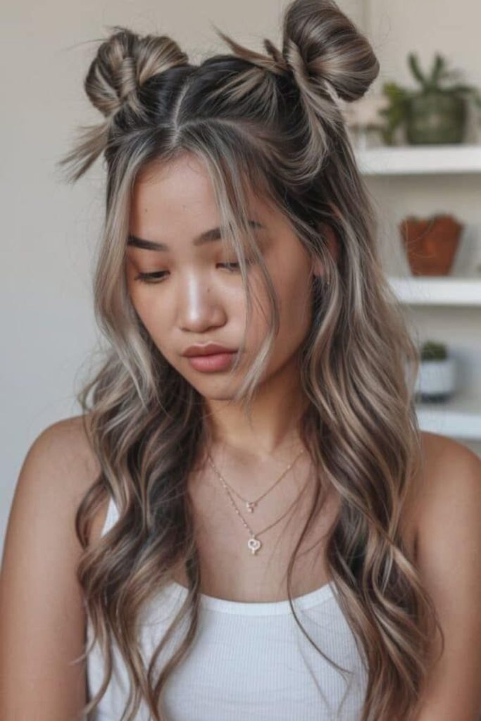 High space buns with glitter accents