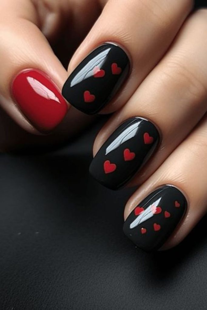 Smoky grey nails with red hearts