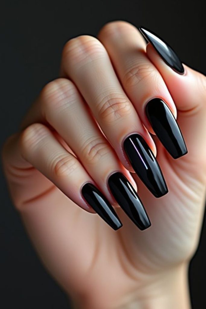 Deep black nails with glossy shards.