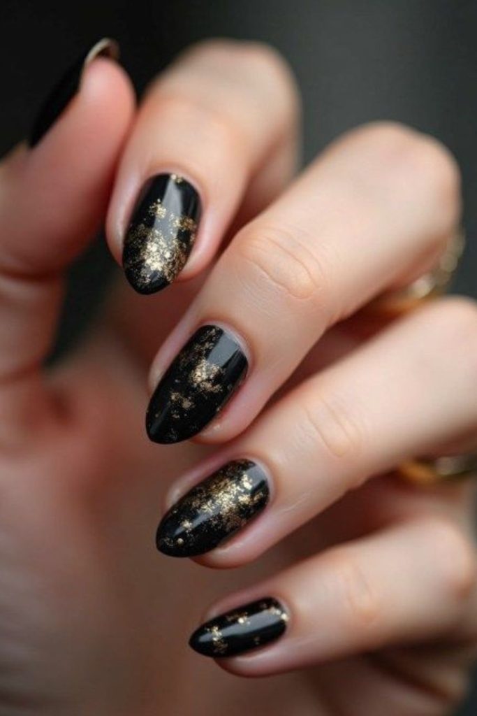 Deep onyx nails with metallic flecks