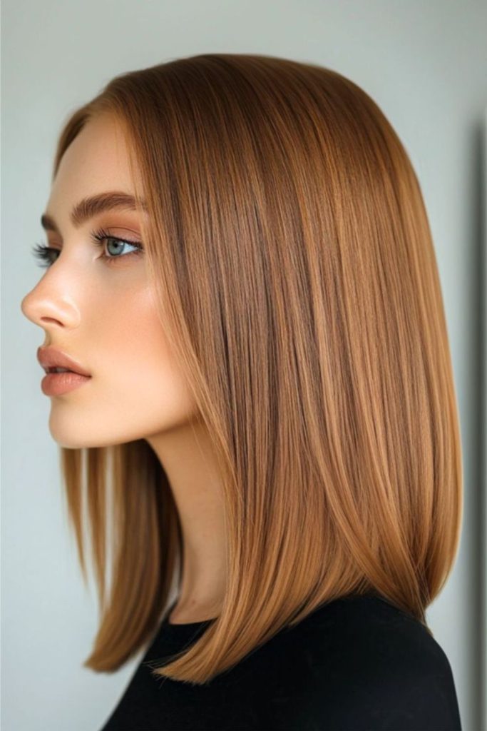 Honey-colored straight hair with soft sheen