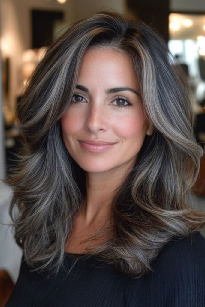 Feathered brunette with light ash streaks