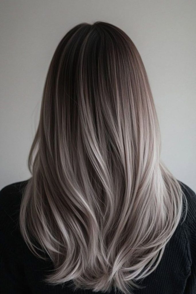 Brunette framed with frosty ash strands