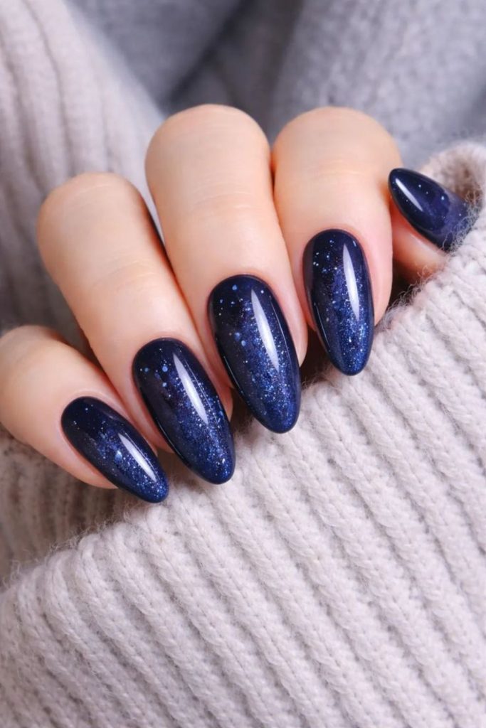 Midnight blue violet nails underwater depth