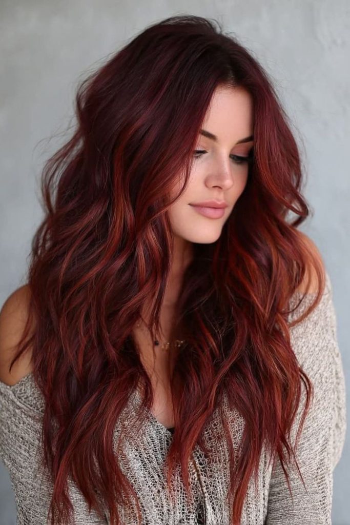 Ember velvet red toned brown waves.