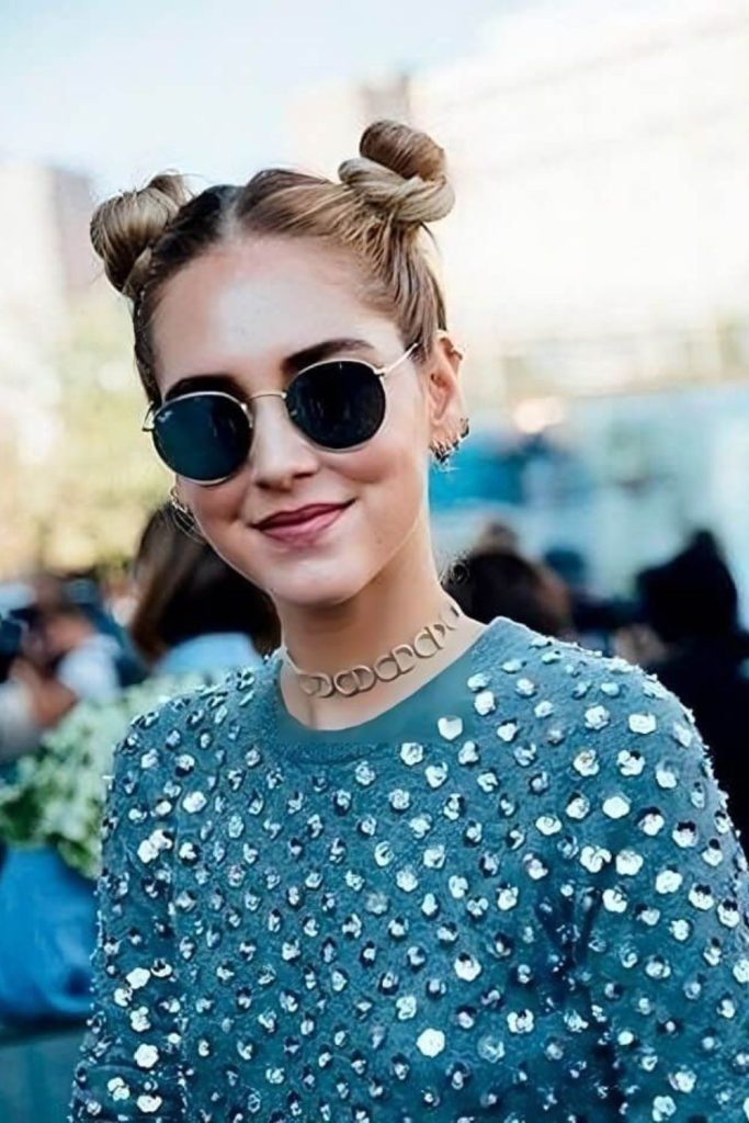 Playful space buns dance hairstyle