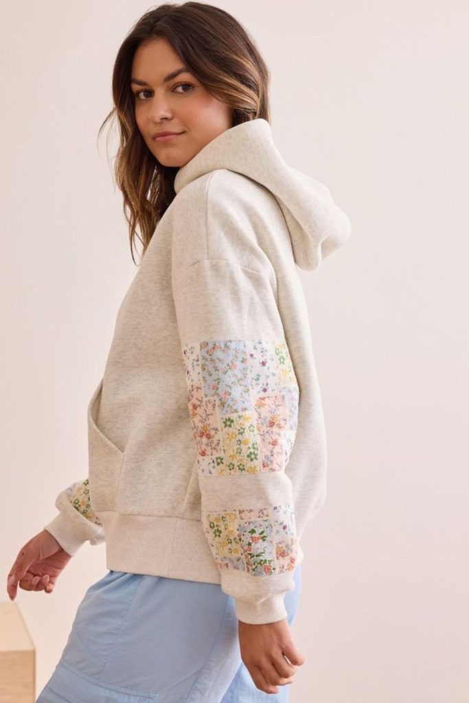 Beige cardigan plaid trousers outfit.