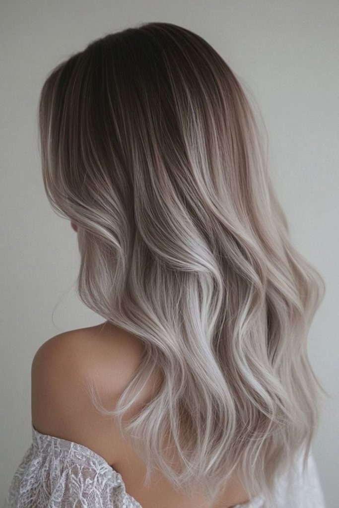 Frost gleam highlights dark hair.