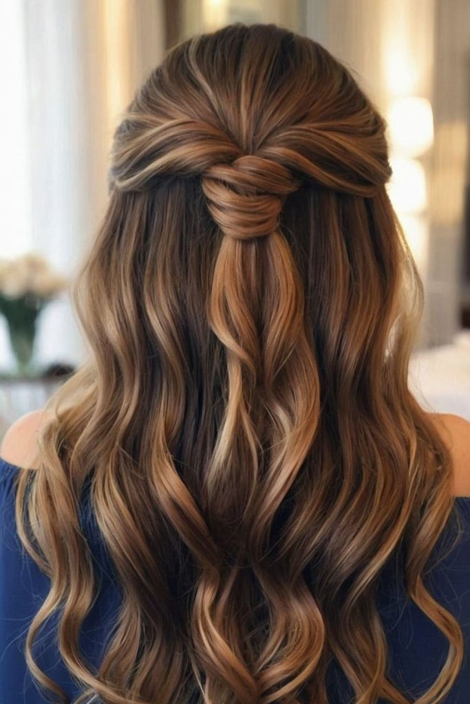 Half-up twisted bridal hairstyle with pearls