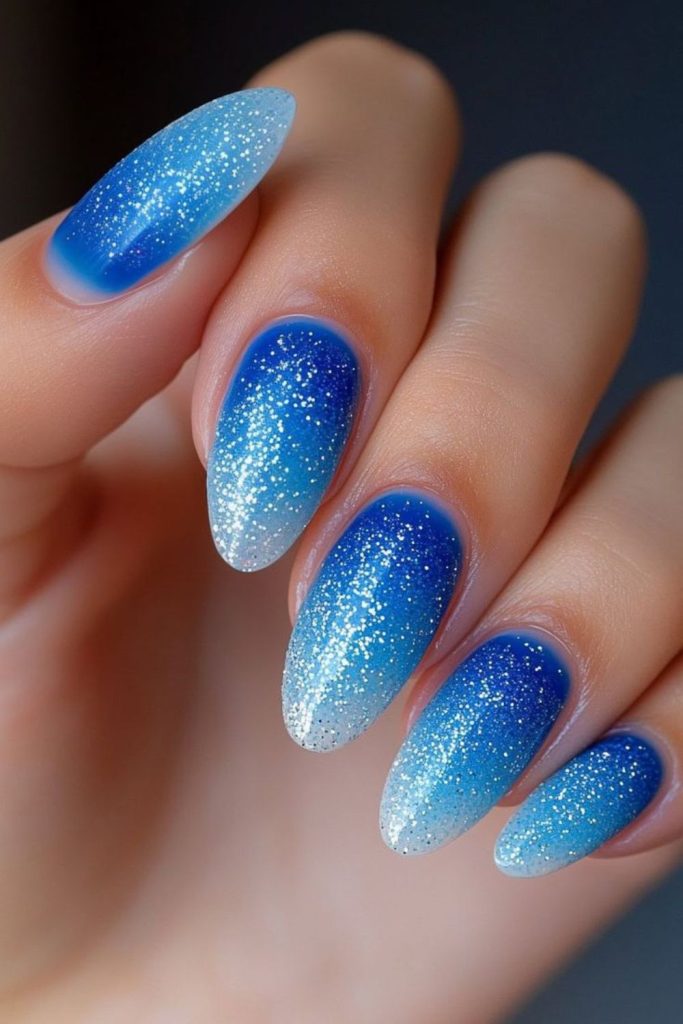 Blue translucent nails with holographic shards
