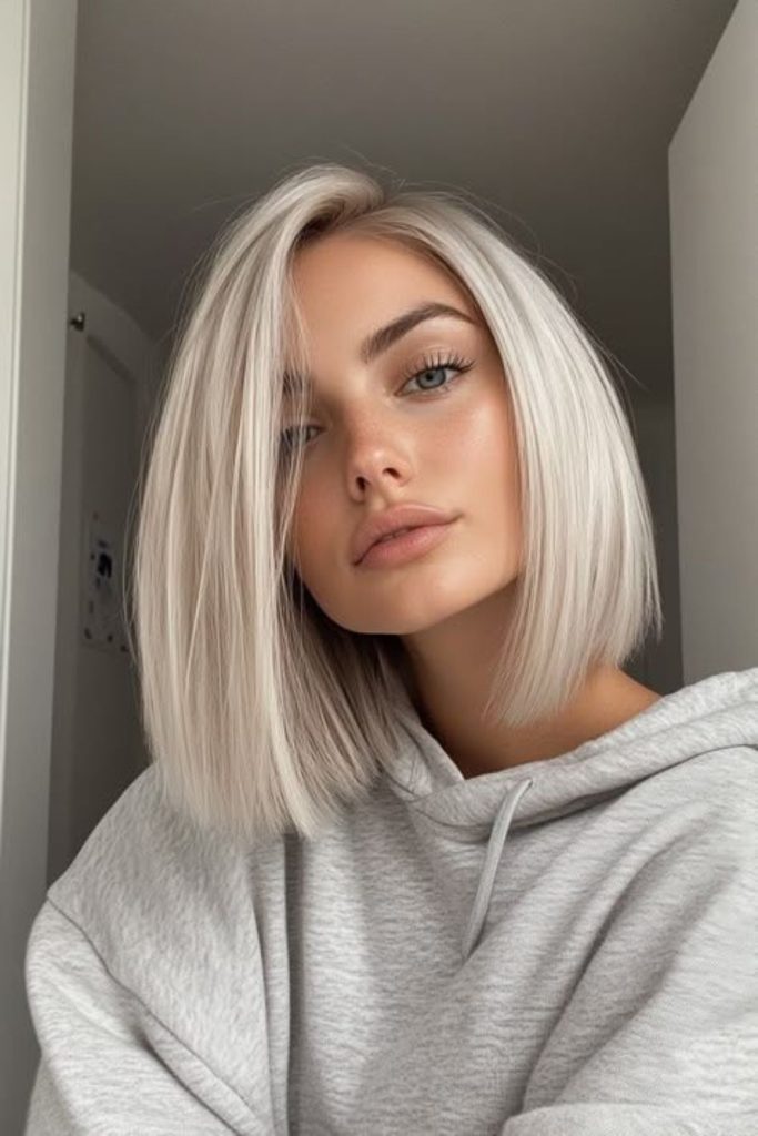 Sleek straight platinum hair with shine