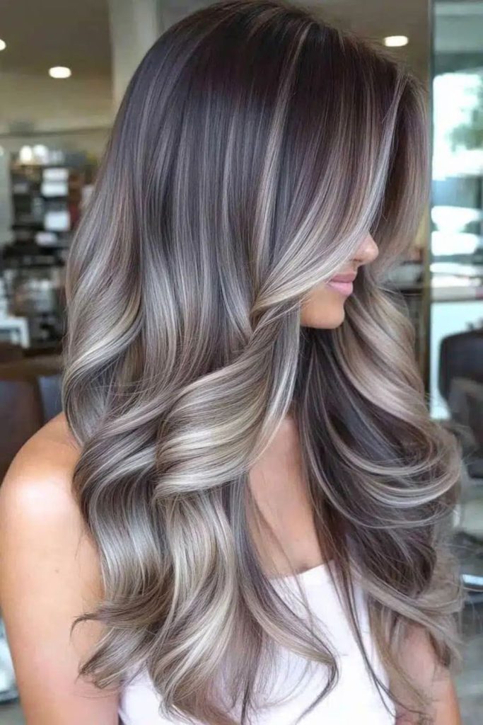 Icy ash highlights on dark hair.