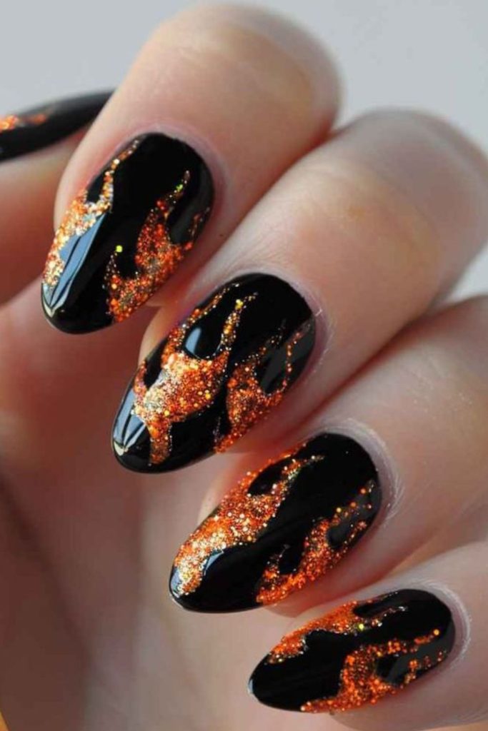 Molten orange and black fiery nails