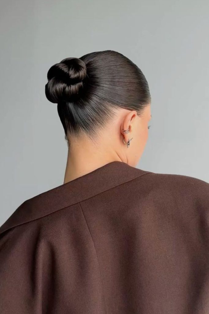 Sleek back knot polished dance look