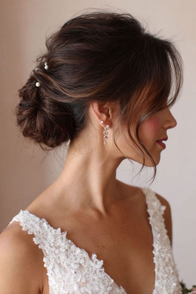 Elegant low chignon with jeweled details