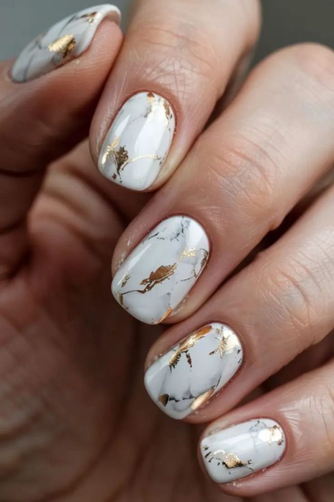 Soft gray marble effect nail design