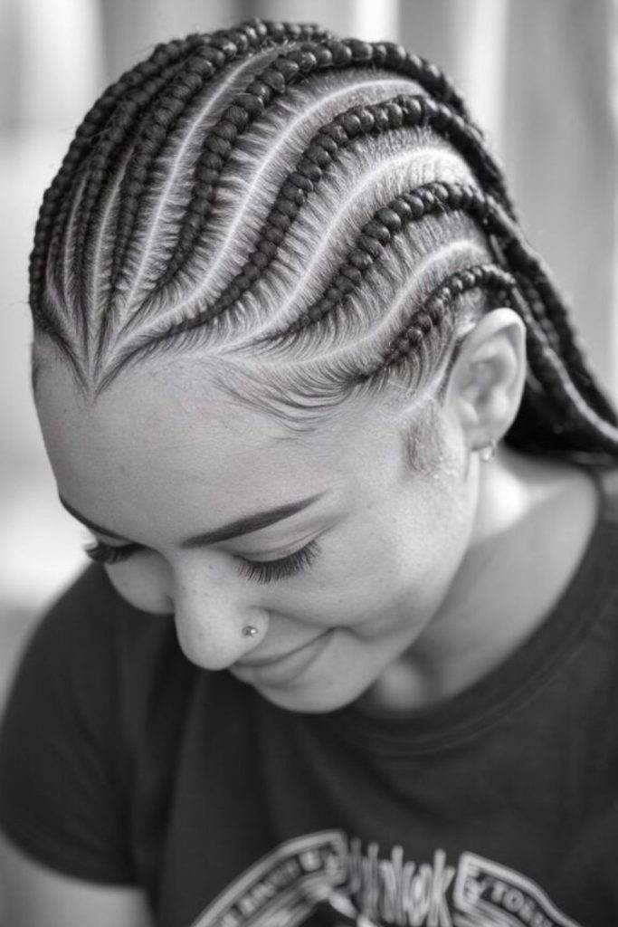 Intricate labyrinth-pattern cornrows art